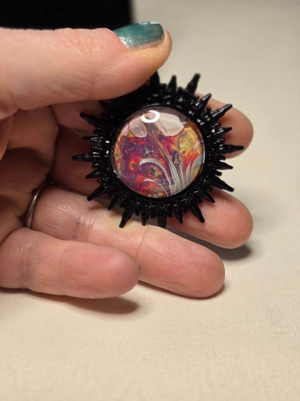 Vibrant Handcrafted Sunburst Pin with Multicolor Center - Picture 2 of 4